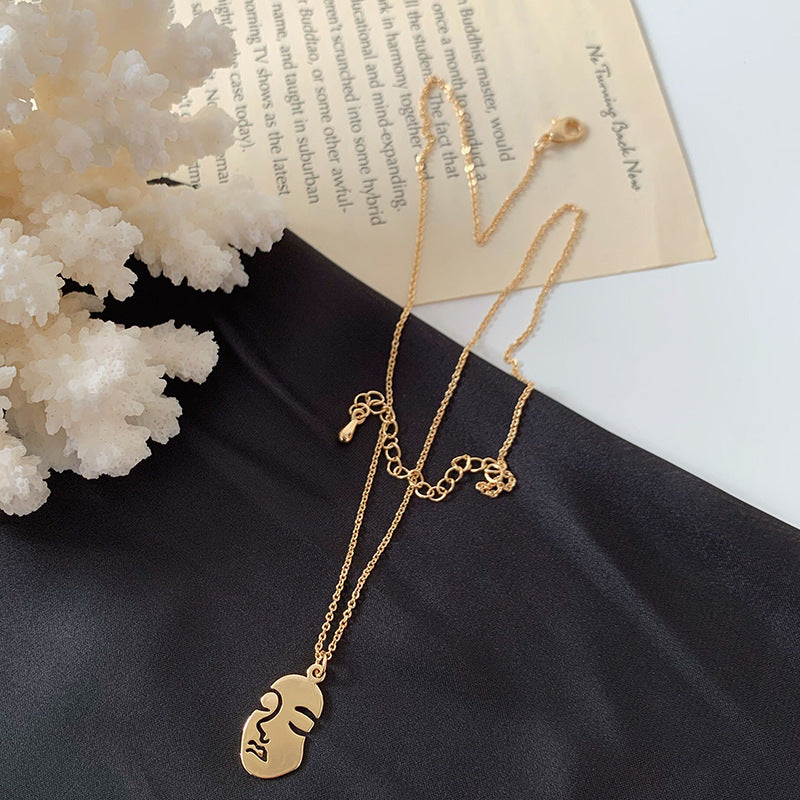 Abstract Face Metal Choker Necklace