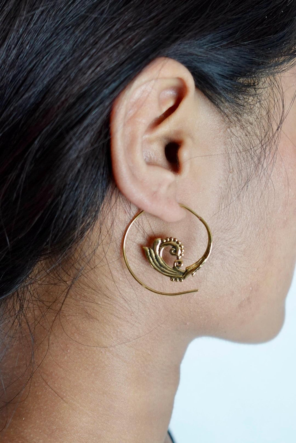 Boho Spiral Shell Hoops - Swirl-Pattern Brass Earrings with Ethnic Touch.