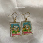 Castle stamp dangle gold earrings