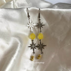 Stainless steel star and yellow bead statement dangle earrings