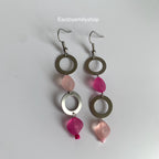 Stainless steel circle and asymmetrical pink bead statement dangle earrings