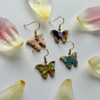 Colourful marble effect gold butterfly earrings