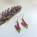 Purple larkspur flower dangle earrings on 18k gold plated hooks