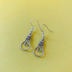 Silver light bulb dangle earrings