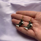Black moon with skeleton face gold earrings
